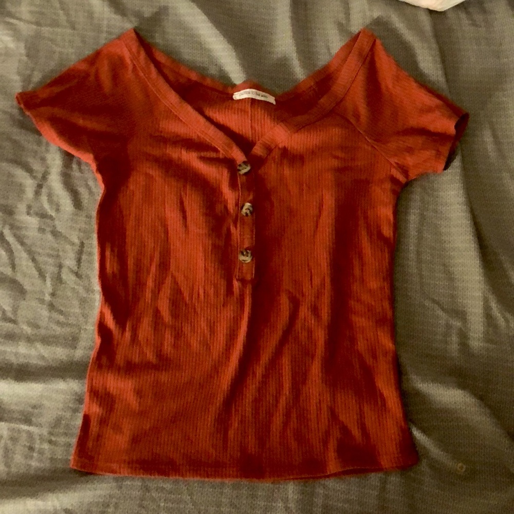 Only worn once or twice, wide-mouth fit top, scoop-like top.